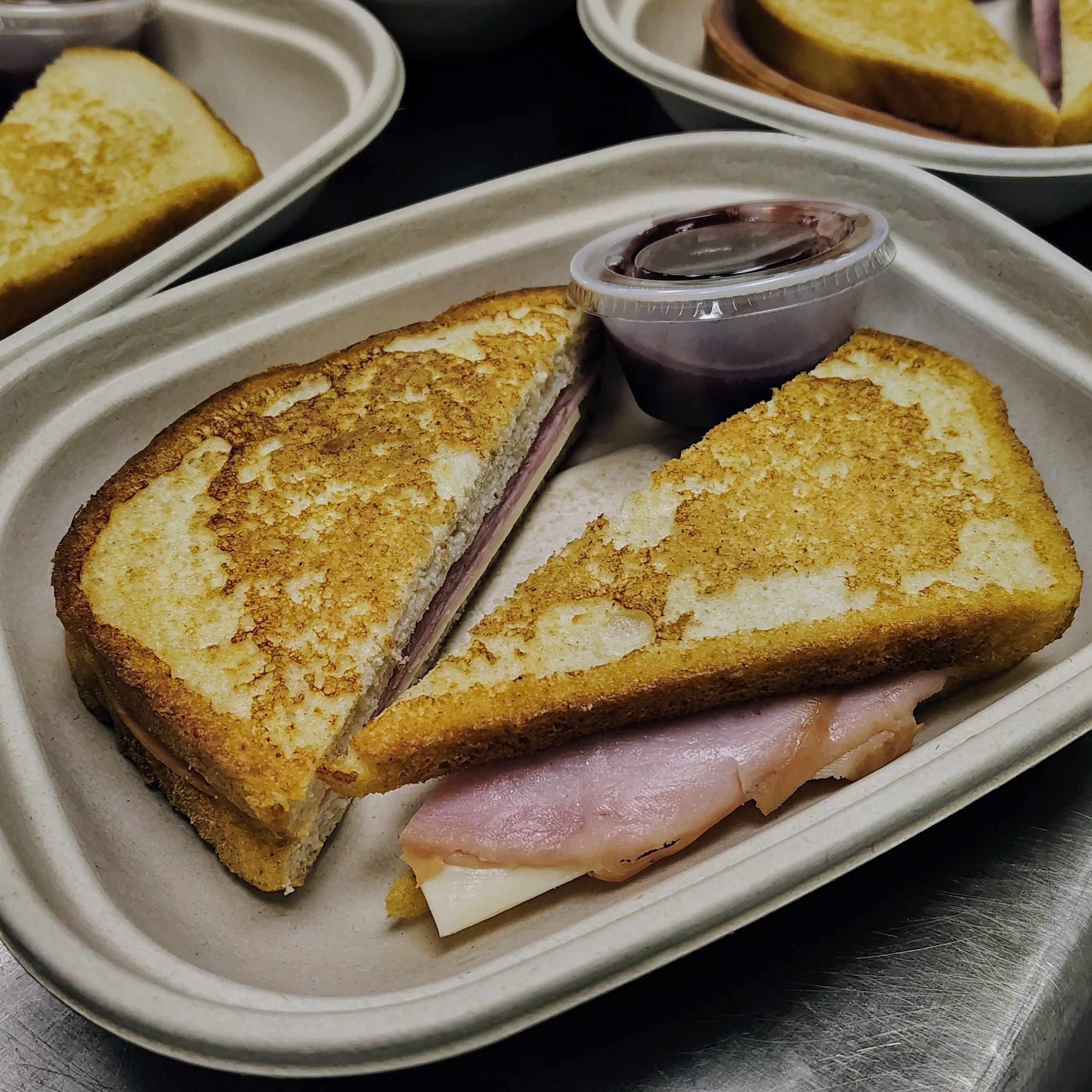 Monte Cristo French Toast Sandwich with Raspberry Dipping sauce 